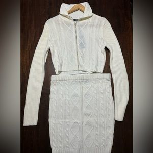 Woman’s size large. Knit skirt and crop sweater. Hera collection. New w/tags
